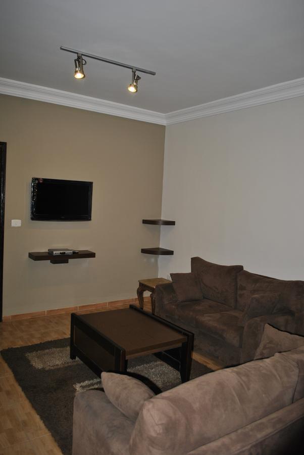 Alballouti Hotel Suites Amman Oda fotoğraf